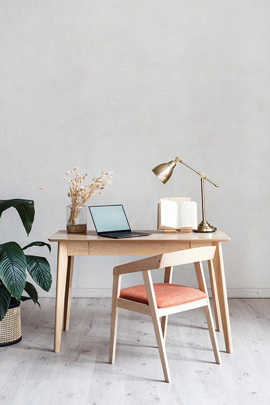 Home Office with Wooden Furniture and Laptop